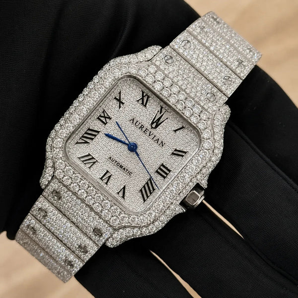 Platonic AUREVIAN automatic luxury square wristwatch with an iced-out stainless steel case, bracelet, and blue hands.