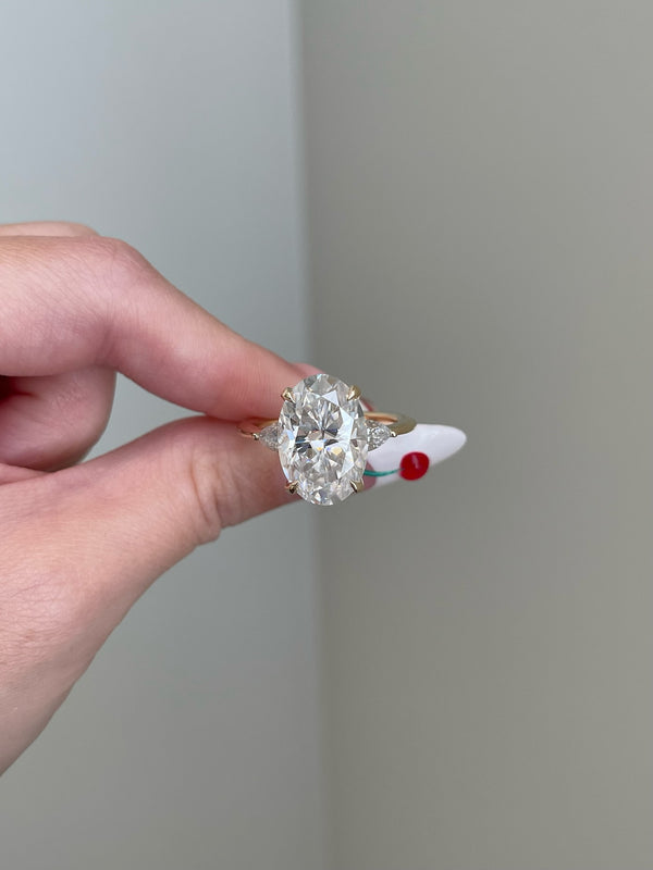 Platonic Crushed Ice Hybrid Oval Cut Moissanite 4-Prong w/ Pear Shape Moissanite Hidden Halo Solitaire Cathedral Engagement Ring