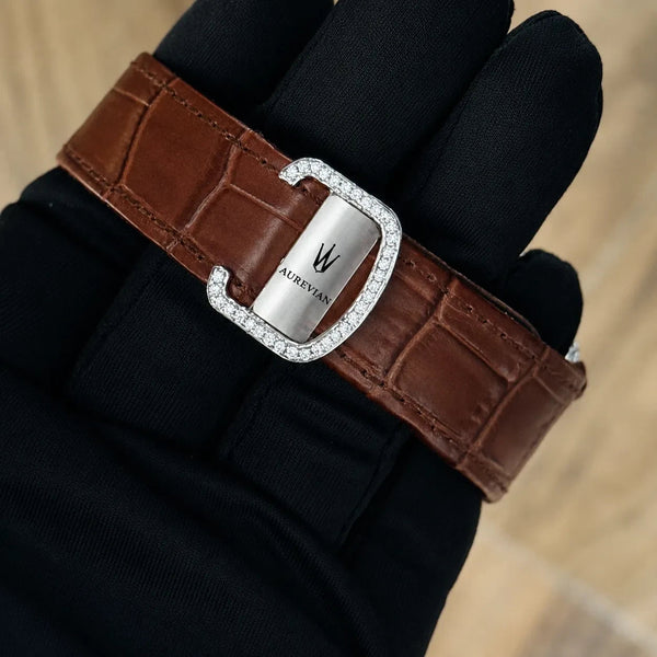 Platonic AUREVIAN automatic watch featuring a brown alligator-embossed leather strap and a stone-encrusted steel clasp.
